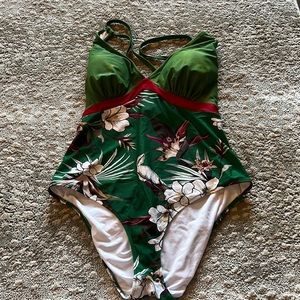 Green one piece swim suit